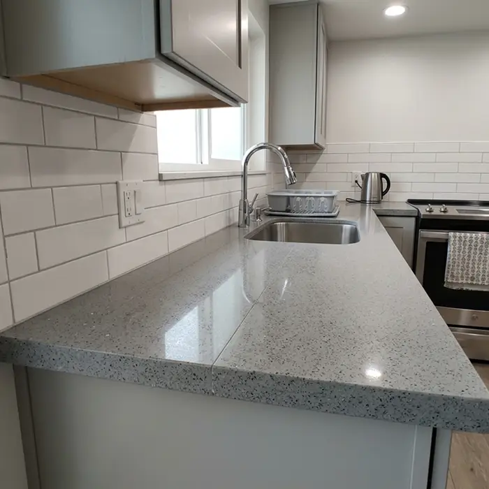 Quartz countertops with tile backsplash