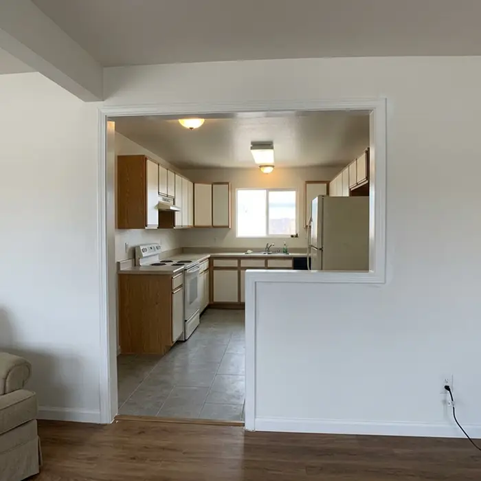 Open concept kitchen after wall removal