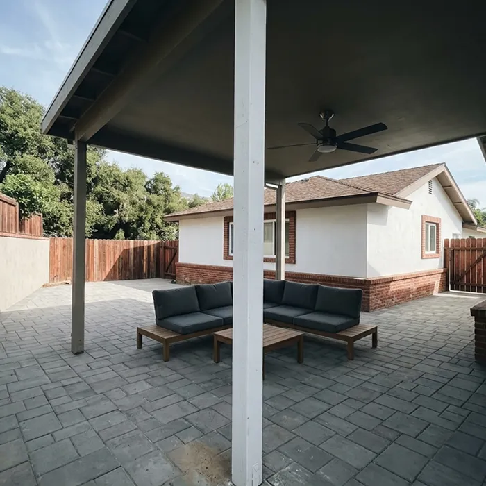 Covered patio seating area built by KAN Builders