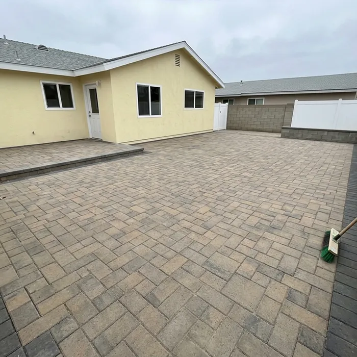 Pavers & Hardscape — paver patio with seat wall