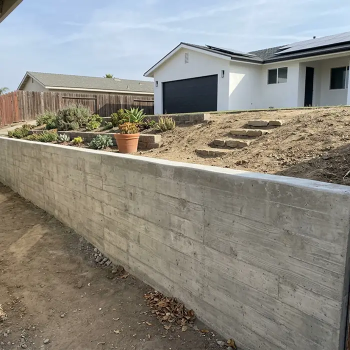 Cast-in-place poured concrete retaining wall