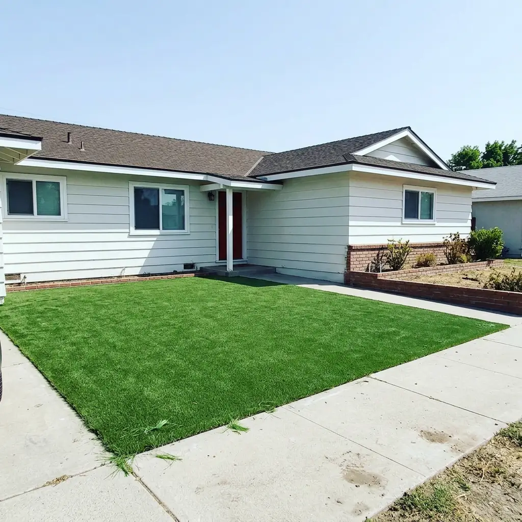 Synthetic turf front yard installation at a San Diego County home by KAN Builders